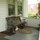 Benches are provided on both the front porch and back deck