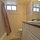 This bath now has curved shower rod. 