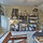 Bookcases.  Opposite sofa.