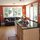 Relax in the sunny kitchen on the leather couch, or cook yourself a delicious meal.