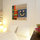 double bedroom with lots of stuff to read