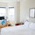 Comfortable Queen-sized bed with crisp linens