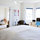 Bedroom doors open up to the living room