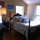 Antique Wooden bed with brand new mattress and fresh linens!