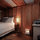                                                                    Romantic and cozy cabin at night with gas heater