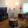 Every detail accounted for. Large plasma TV. DVD player, 6 CD player. Center table comes apart into 3 difference pieces. All nestled in an Art Deco building. 