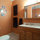 shared bathroom with organic shampoo, conditioner, and soaps