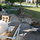 Side patio with portable firepit.