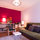 I don't mind grey weather or rainy days. My magenta wall and my PH5 Lamp (Design: Poul Henningsen) keeps me happy all the time. The bed turns into a sofa at daytime
