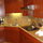 Granite countertops in kitchen which has all the amenities of home - right off the living room.