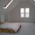 Master bedroom with vaulted ceilings and skylights on 2nd floor
