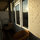 Our balcony, with doors from the kitchen and the guest bedroom (the door in this photo opens from the balcony)