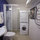 Bathroom with washing machine and dryer