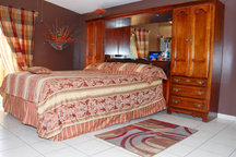 Large master bedroom with balcony