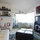 Here is where you would enjoy the 60 inch screen tv and the love sac in the corner
