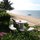 Imagine yourself dining & sipping your favorite drink here at our beachside table as your take in the serene bliss of the calming sea.