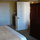 Bedroom has separate access to bathroom and living room area