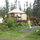Gardening before covered lanai.
