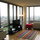 Living room with floor to ceiling windows and amazing views!