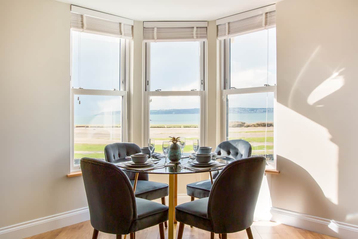 Stylish Beachfront Apartment with Castle & Sea Views