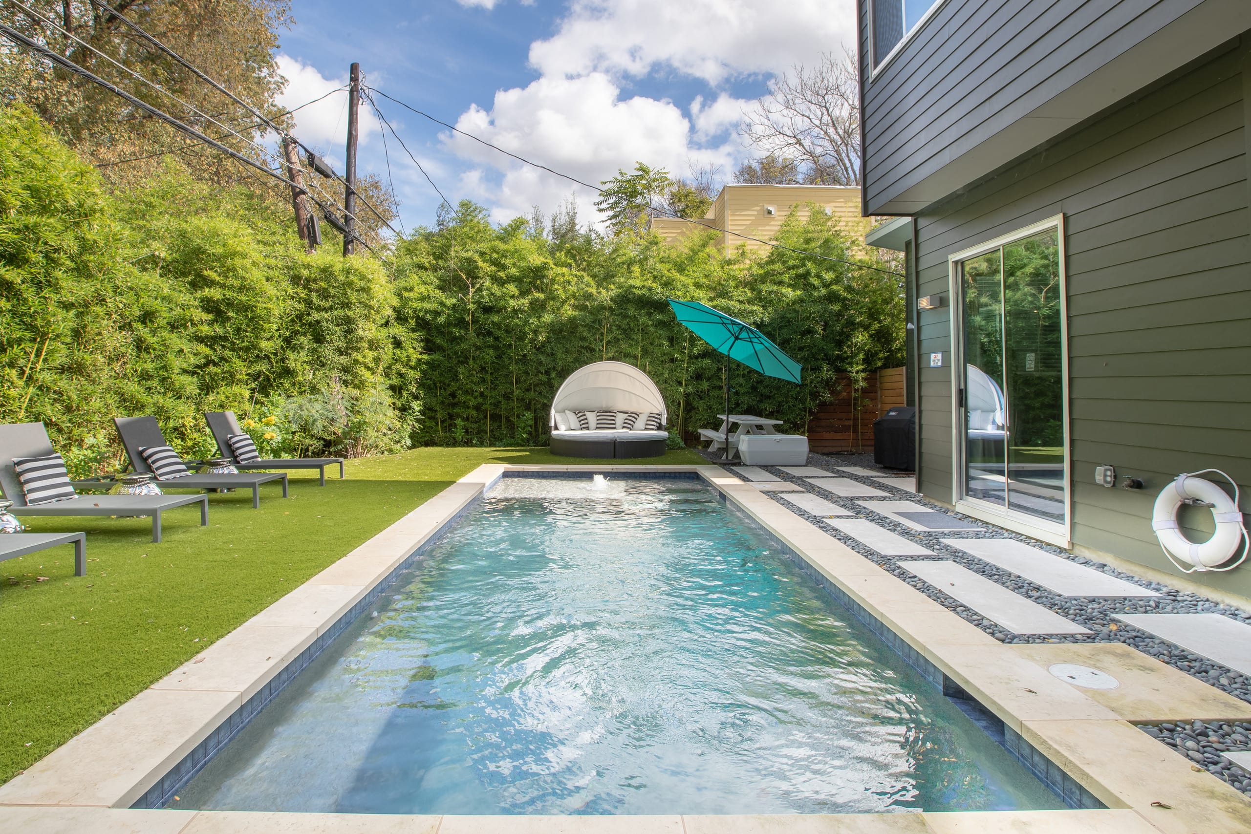 Soak in the Heated Pool of a Chic Home Near Everything Houses for