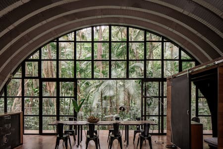 Swim Under a Private Waterfall at a Tranquil Forest Haven