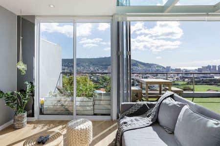 Modern, Chic Penthouse with Mountain, City & Sea Views