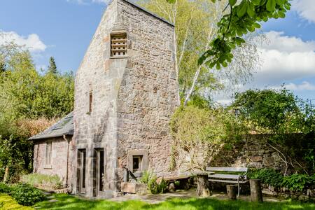 16th Century Dovecot Cottage in Private Garden.
