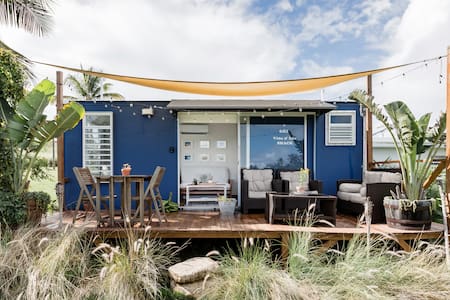 Experience Tropical Camping at a Cabin Close to the Ocean