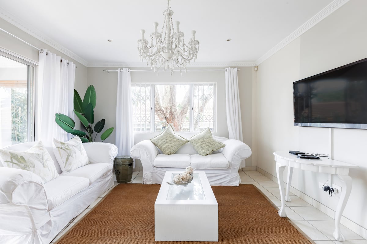 Take it Easy on the Beachy Balcony at a Free-Flowing Haven