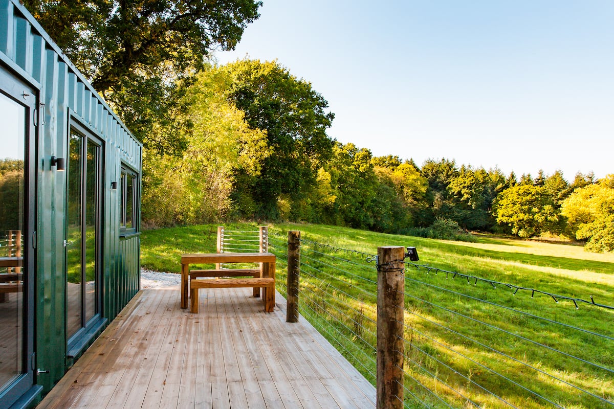 Converted Shipping Container Nestled in a Private Meadow
