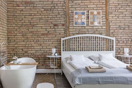 Relax into Loft-Style Living at a Grand Urban Sanctuary