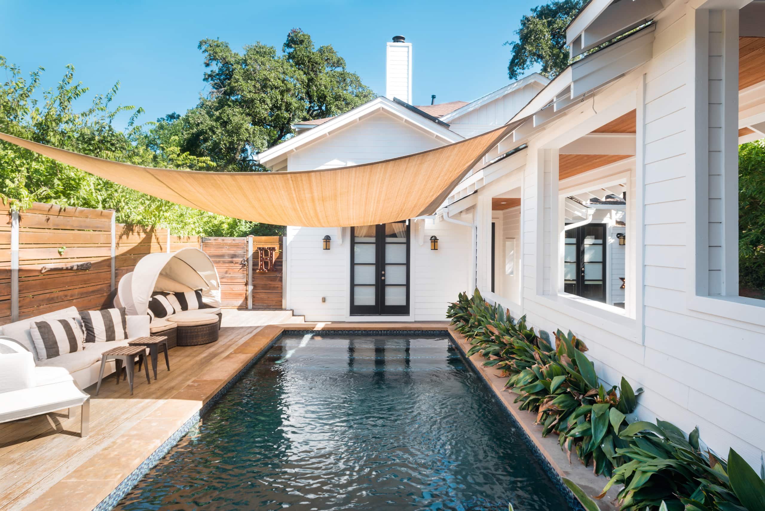 Enjoy the Heated Pool at a Beautifully Designed Getaway Houses for