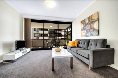 Central 2 bed, 2 bath modern apartment with patio