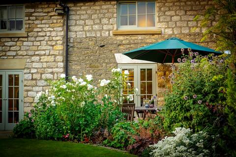 Character cottage with a garden and a village pub