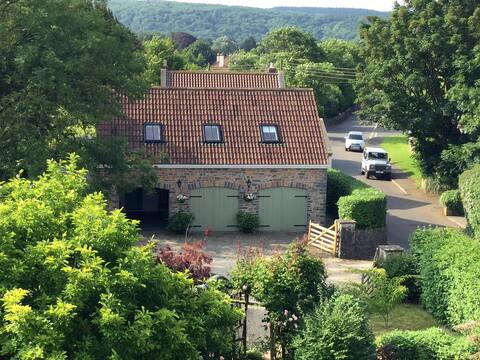 Stylish garden coach house  in popular village