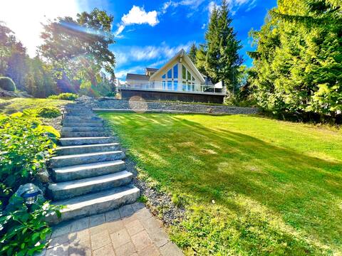 lakefront home with hot tub