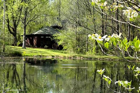 Unique luxury cabin with fireplace and pond view