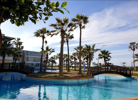 One min walk from the beach with pool view