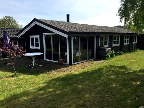 Lovely log house with 100 meters to private beach