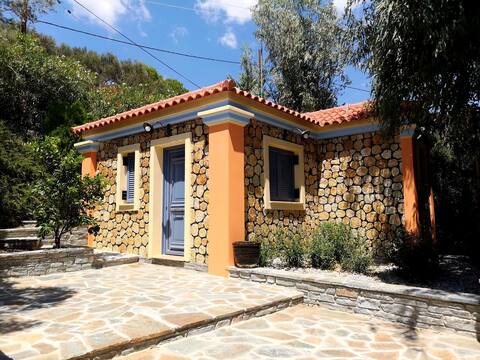 Traditional stone house by the sea with pool.