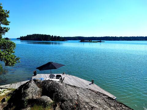 Modern house on the sea plot with a private jetty secluded location