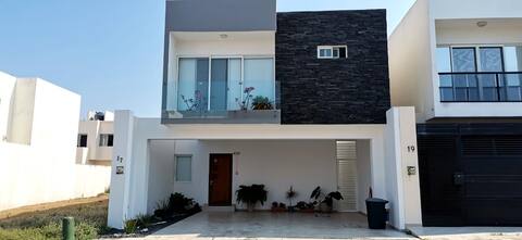Home minutes from the beach with pool access