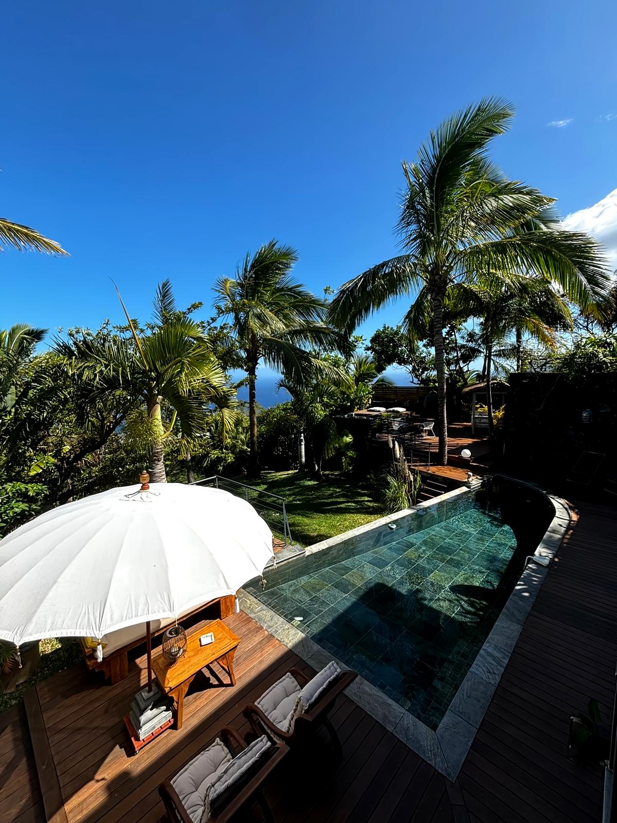 Propiedad de Airbnb exitosa: Chic Tropical Villa • Sea View • Pool • Spa en Les Avirons