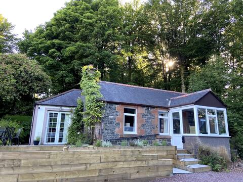 Estate cottage in extensive gardens.