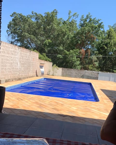 House with swimming pool in nature