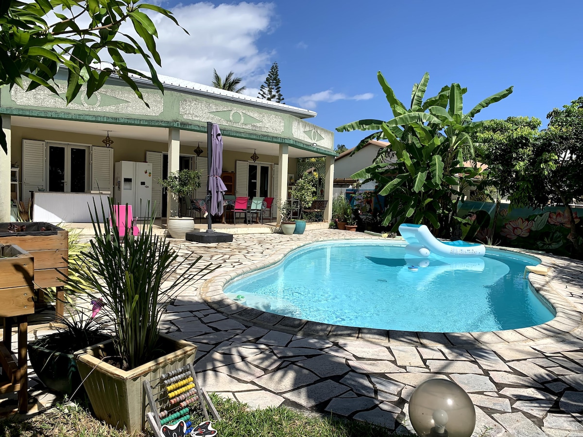 Popular Airbnb listing: villa with veranda, garden, pool in La Possession