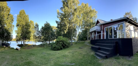 House by the lake on its own peninsula