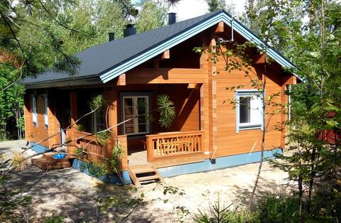 Ferienhaus am See (Sauna, Steg, Ruderboot, WiFi)