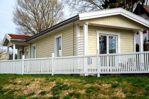 Cozy wooden house with private entrance and small garden